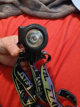 E03050 Petzl Headlamp With Extra Bulb. Parts Only As-is