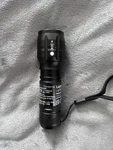 Lighting Ever Led Flashlight 1200012-US Black Metal Aaa Battery With Wrist Strap. Fixed Price $10.00.