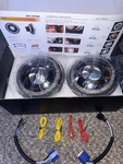 Hwstar 7" Halo Starry Dragon Eye 1000% Bright Anti Glare Led Headlights 6000K. Fixed Price $80.00.