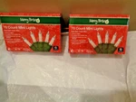 Two Pack Merry Brite Each 70 Count Mini Style Lights White Bulb Green Wire. Fixed Price $12.99.