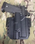 Staccato P With Surefire X300 Light Outside The Waistband Holster. Fixed Price $55.00.