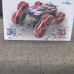 Eulogia Stunt Car Remote Control 2.4GHZ Red/blue SY073A-1 SY073B-1. Fixed Price $40.00.