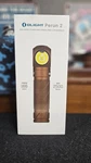 Olight Perun Desert Tan Rechargeable Headlamp 2500 Lumens. Fixed Price $78.00.