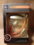 The Sharper Image Hands-free Led Wrap Twin-light Dual Control New. Fixed Price $12.00.